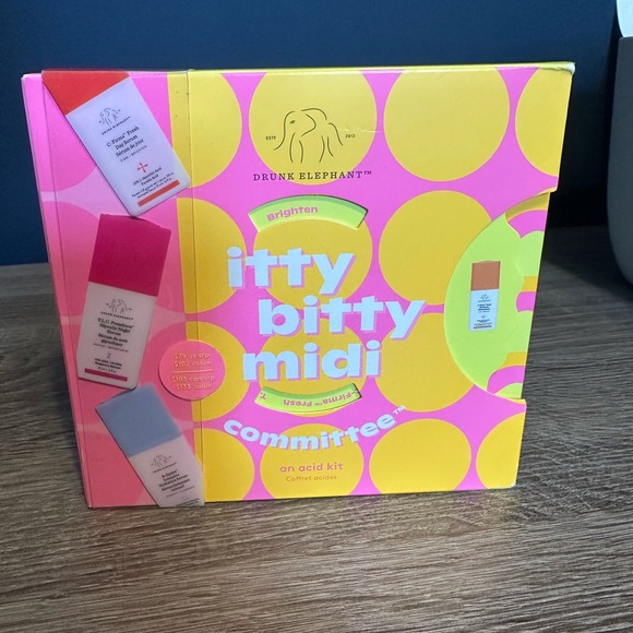 Drunk Elephant Vibrant Yellow and Pink Packaging - Picture 1 of 5